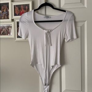 White short sleeved body suit